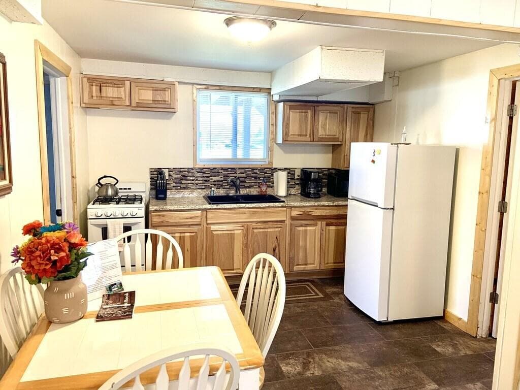Kitchen and dining area with seating for 4 